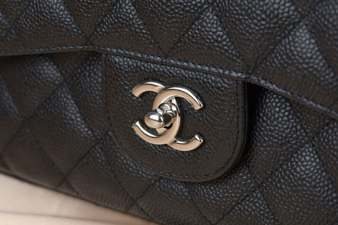CHANEL Black Quilted Calfskin Caviar Timeless Classic Jumbo Double Flap Bag