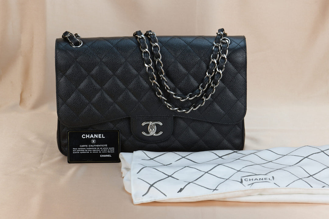 CHANEL Black Quilted Calfskin Caviar Timeless Classic Jumbo Double Flap Bag