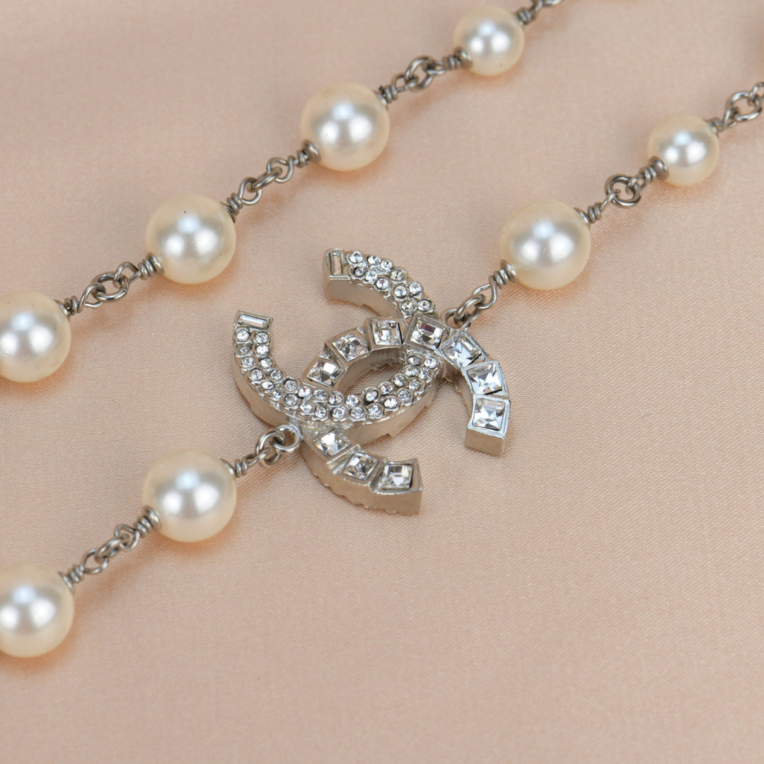 CHANEL Long Pearl Sautoir Necklace with CC logos hearts and charms