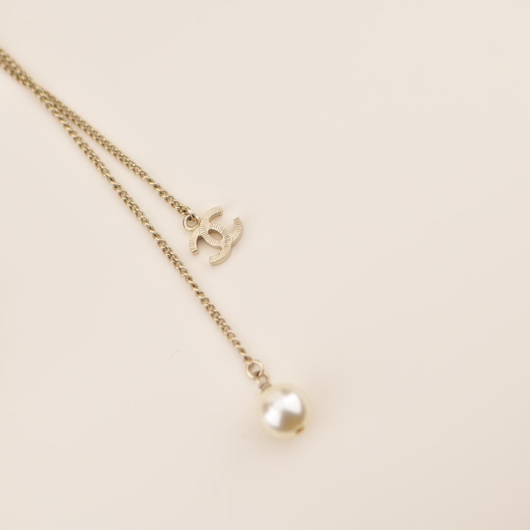 Chanel Vintage Textured CC Logo Faux Pearl Pendant Necklace  Rent Chanel  jewelry for 55month