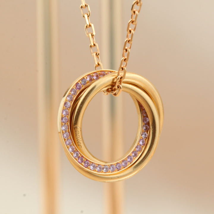 Cartier White, Yellow, Rose Gold and Pink Sapphire Trinity Pendant Necklace