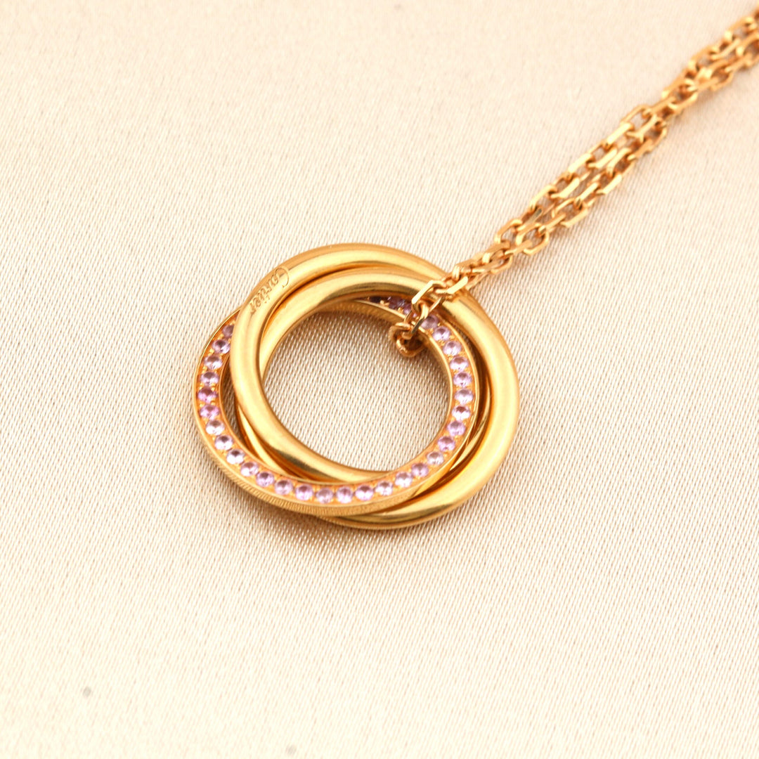 Cartier White, Yellow, Rose Gold and Pink Sapphire Trinity Pendant Necklace