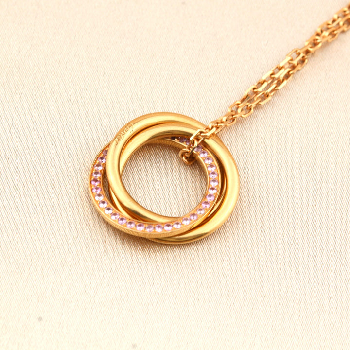 Cartier White, Yellow, Rose Gold and Pink Sapphire Trinity Pendant Necklace