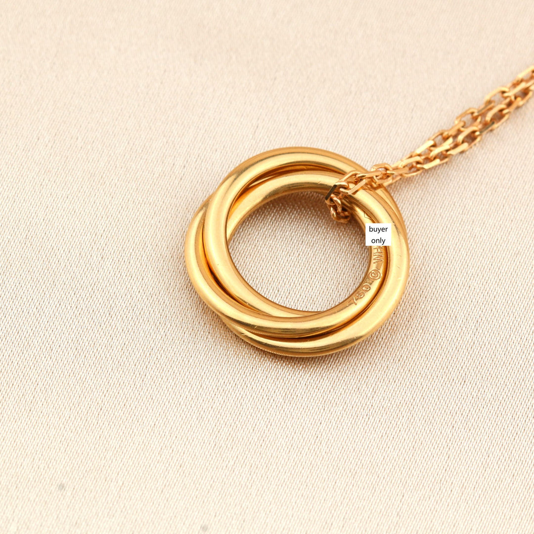 Cartier White, Yellow, Rose Gold and Pink Sapphire Trinity Pendant Necklace