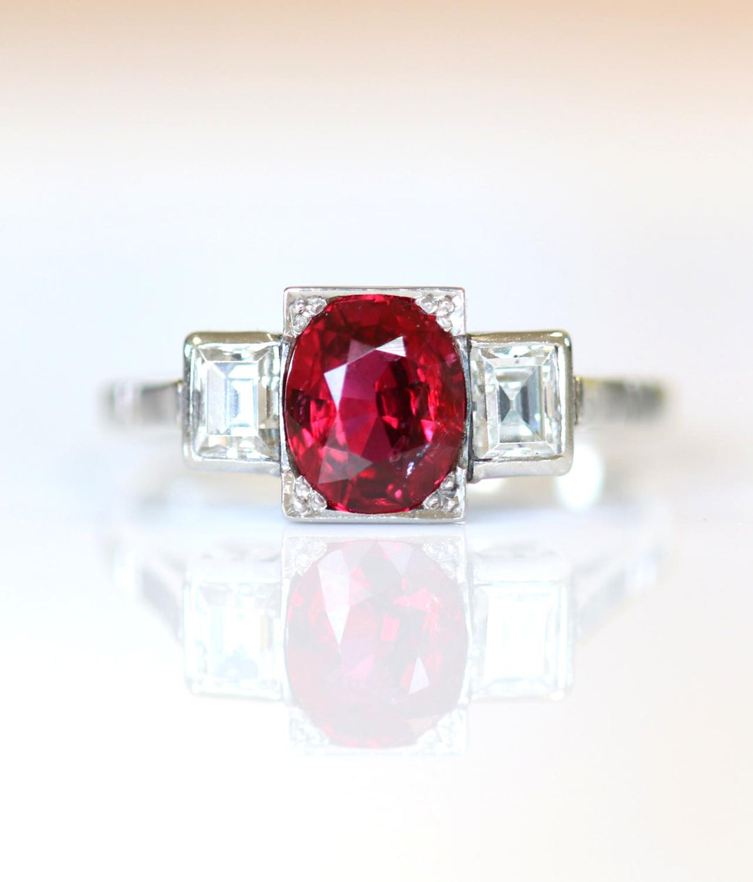 Garrards & Co Art Deco Ruby and Diamond Three-Stone Platinum and Gold Ring