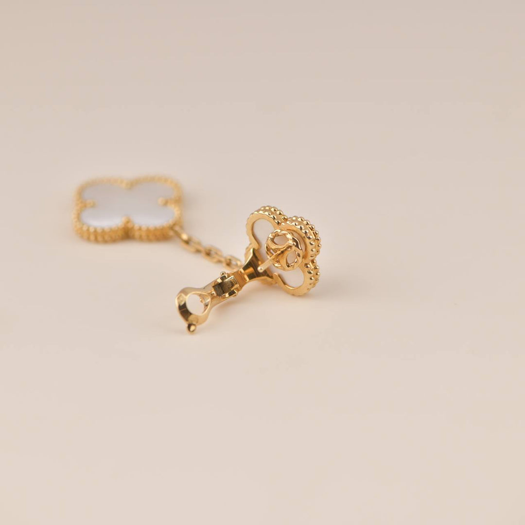 Magic Alhambra earrings, 4 motifs 18K yellow gold, Mother-of-pearl - Van  Cleef & Arpels