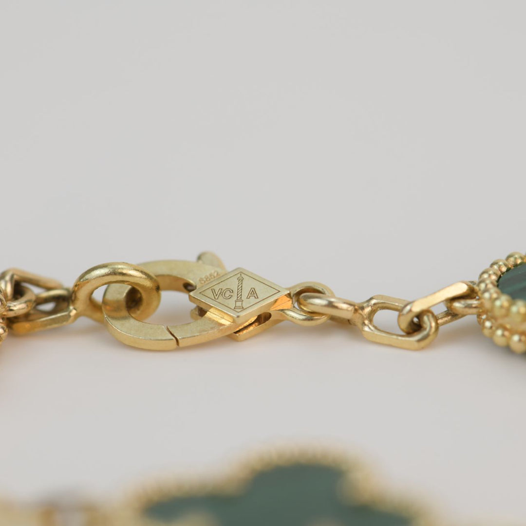 Van Cleef & Arpels 5 Motif Vintage Alhambra Malachite Yellow Gold –  Dandelion Antiques
