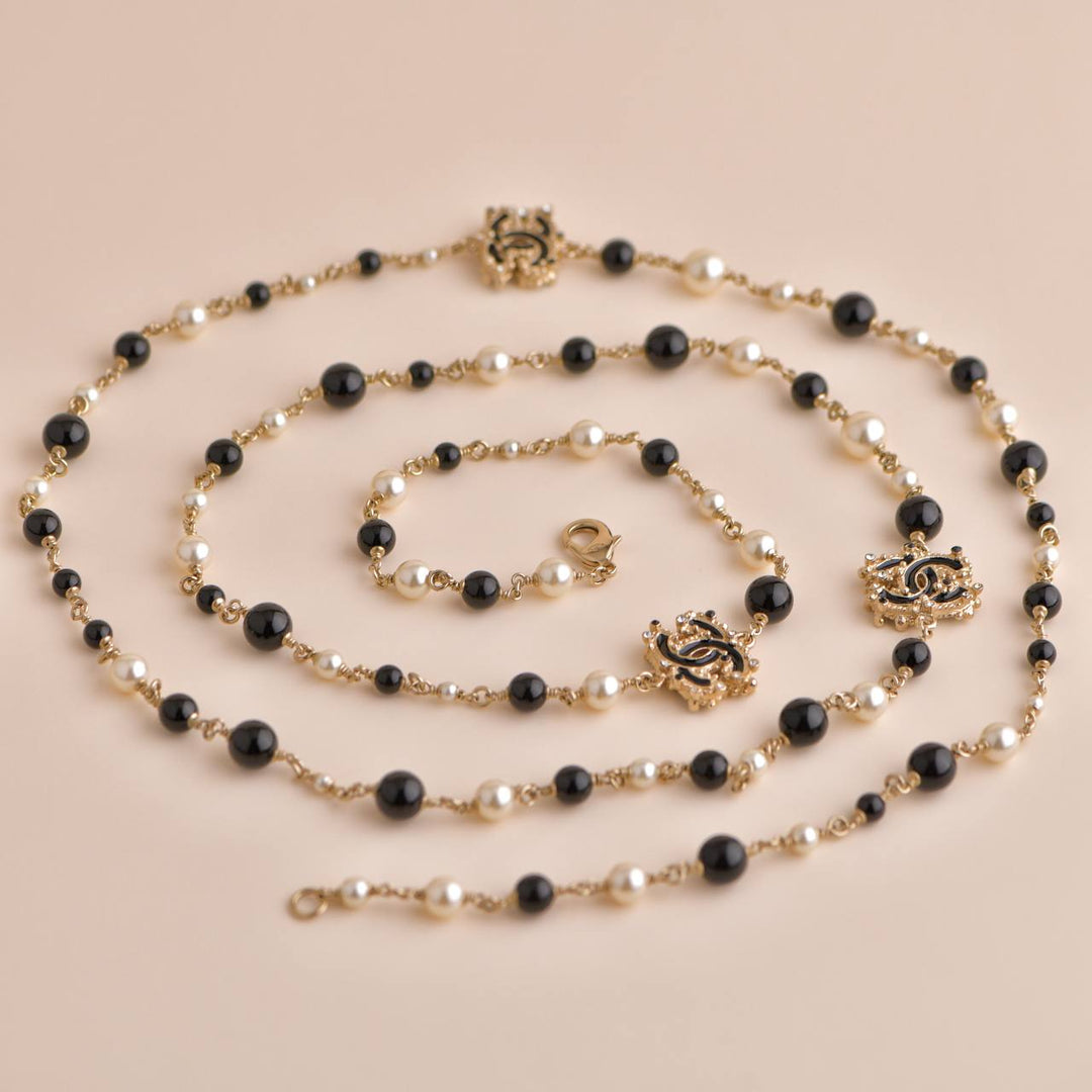 CHANEL LONG NECKLACE WITH GLASS PASTE PEARL AND STRASS CC LOGOS