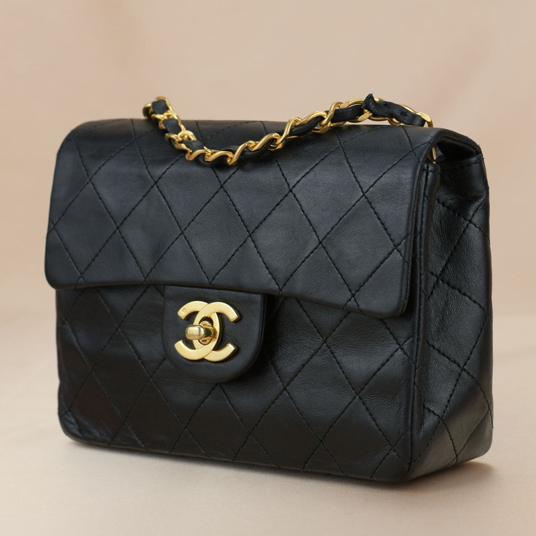 CHANEL Black Quilted Lambskin Mini Square Flap Bag