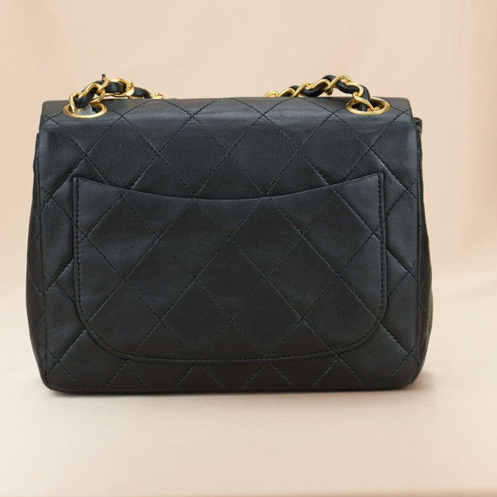 CHANEL Black Quilted Lambskin Mini Square Flap Bag