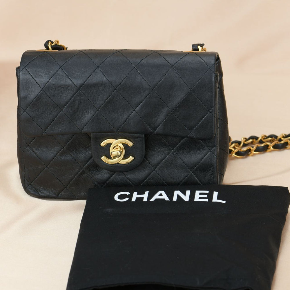CHANEL Black Quilted Lambskin Mini Square Flap Bag