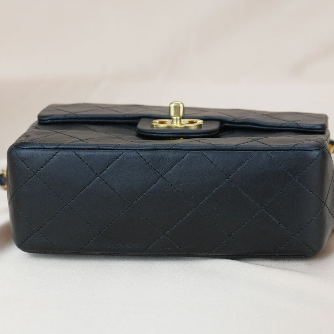 CHANEL Black Quilted Lambskin Mini Square Flap Bag