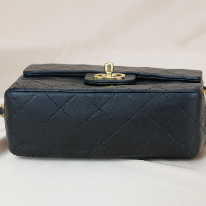 CHANEL Black Quilted Lambskin Mini Square Flap Bag